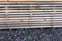 Stacked and stickered rough sawn yellow pine 2x4s drying.