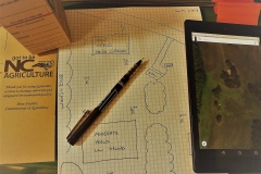 In field soil sampling paperwork.