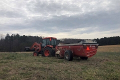 Loading fertilizer to spread in Wake county.